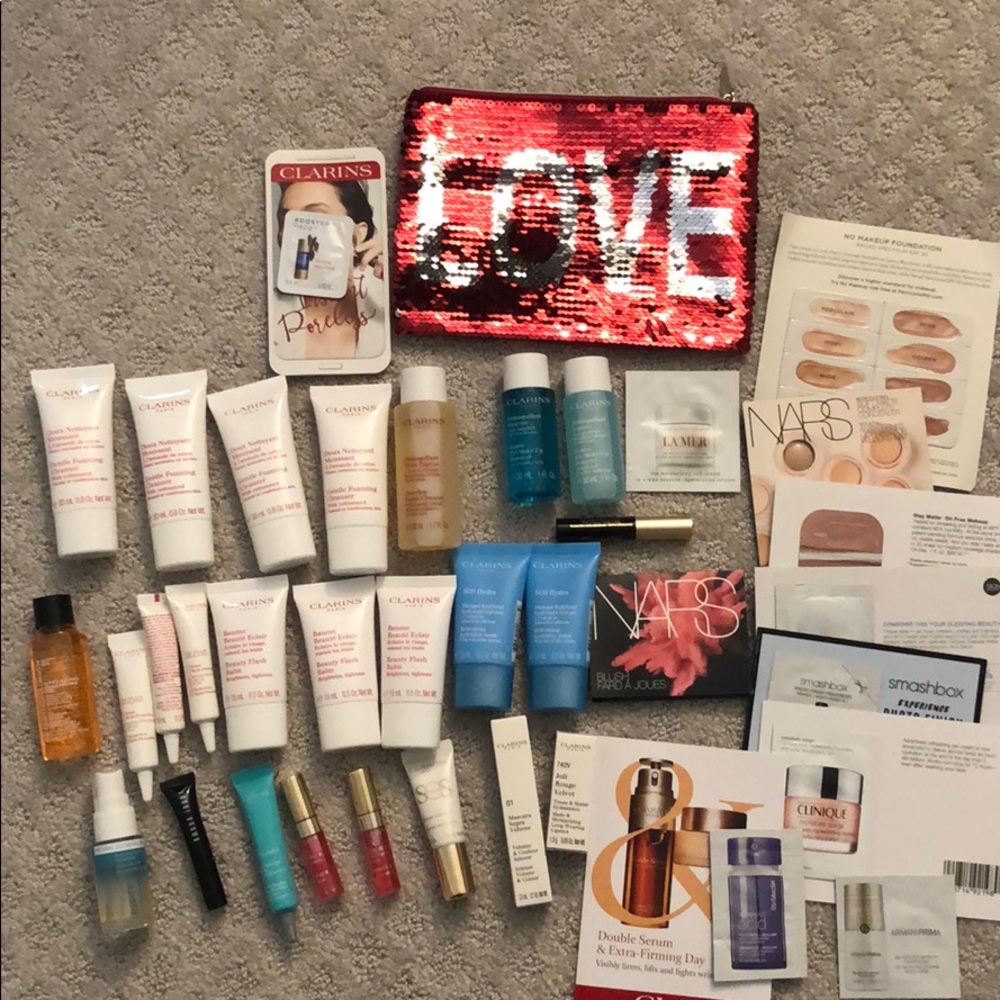 Clarins makeup and skincare samples w makeup bag